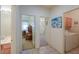 Hallway leading to the bathroom, laundry room, and additional bedroom at 29922 N Little Leaf Dr, San Tan Valley, AZ 85143