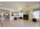 Spacious living room with an open floor plan and abundant natural light at 29922 N Little Leaf Dr, San Tan Valley, AZ 85143