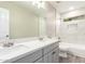 Bathroom featuring double sinks, bright lighting and modern fixtures at 3327 S Felix Way, Chandler, AZ 85248