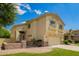 Two-story home with a tile roof, decorative accents, and a well-maintained front yard at 3327 S Felix Way, Chandler, AZ 85248