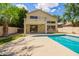 Home boasts an inviting pool and a large backyard for relaxation at 3327 S Felix Way, Chandler, AZ 85248