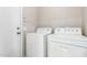 Functional laundry room includes full-size washer and dryer at 3327 S Felix Way, Chandler, AZ 85248