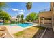 Sparkling pool and patio create an oasis in the backyard at 3327 S Felix Way, Chandler, AZ 85248
