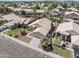 Aerial view of single-story home featuring a neutral color scheme, a tile roof, and desert landscaping at 2390 S Walnut Dr, Chandler, AZ 85286