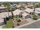 Aerial view of single-story home with desert landscaping, tile roof, and long driveway at 2390 S Walnut Dr, Chandler, AZ 85286