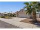 Charming single-story home with desert landscaping and a two-car garage in a quiet neighborhood at 2390 S Walnut Dr, Chandler, AZ 85286