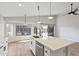 Kitchen featuring a large center island, stainless steel appliances, and modern finishes at 2390 S Walnut Dr, Chandler, AZ 85286