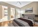 Bright bedroom with grey bedding, and en-suite bathroom at 3108 W Ravina Ln, Anthem, AZ 85086