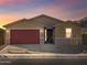 New single-story home with a two-car garage and desert landscaping at 5065 W Hunter Trl, San Tan Valley, AZ 85144