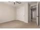 Spacious bedroom featuring a closet, ensuite bathroom and neutral carpet at 22882 E Marsh Rd, Queen Creek, AZ 85142