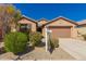 Charming single-story home with a well-maintained yard and a two-car garage, perfect for suburban living at 22882 E Marsh Rd, Queen Creek, AZ 85142