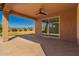 Covered patio with tiled floor, ceiling fan, and outdoor space at 22882 E Marsh Rd, Queen Creek, AZ 85142