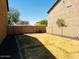 Small backyard with patio and gravel at 7213 S 12Th Pl, Phoenix, AZ 85042