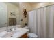 Clean bathroom with a shower/tub combo and vanity at 42608 N 46Th Ave, New River, AZ 85087