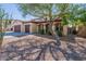 Two-story house with a three-car garage and desert landscaping at 42608 N 46Th Ave, New River, AZ 85087