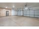 Spacious garage with built-in cabinets and epoxy flooring at 42608 N 46Th Ave, New River, AZ 85087