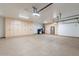 Large garage with ample storage and a clean finish at 42608 N 46Th Ave, New River, AZ 85087