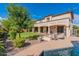 House exterior with pool and covered patio at 42608 N 46Th Ave, New River, AZ 85087