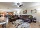 Open concept living room with a view of the kitchen and dining area at 42608 N 46Th Ave, New River, AZ 85087