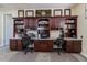 Spacious home office featuring a large desk and abundant storage at 42608 N 46Th Ave, New River, AZ 85087