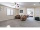 Relaxing sitting area with two armchairs, offering a view of the Primary bedroom at 42608 N 46Th Ave, New River, AZ 85087