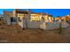 Contemporary home with sleek design, a private backyard, and desert landscaping for a luxurious outdoor experience at 36323 N 100Th Way, Scottsdale, AZ 85262