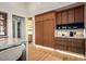Well-appointed kitchen featuring custom cabinetry, modern appliances, and a countertop, perfect for culinary enthusiasts at 36323 N 100Th Way, Scottsdale, AZ 85262