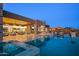 Backyard with a spa, an infinity pool, and a covered patio, perfect for entertaining or relaxing by the pool at 36323 N 100Th Way, Scottsdale, AZ 85262