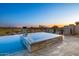Beautiful backyard spa, an infinity pool, and fire pit features offers the perfect place to relax and enjoy the view at 36323 N 100Th Way, Scottsdale, AZ 85262
