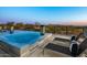 Inviting pool and spa with comfortable lounge seating and stunning mountain views create an outdoor oasis at 36323 N 100Th Way, Scottsdale, AZ 85262