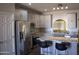 Beautiful kitchen with island, stainless steel appliances and gray cabinets at 1527 E Germann Rd, San Tan Valley, AZ 85140
