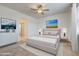 Bright bedroom featuring a plush bed, white dresser, and calming artwork for a serene retreat at 11500 E Cochise Dr # 2090, Scottsdale, AZ 85259