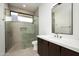 Clean bathroom with walk-in shower and modern vanity at 28805 N 114Th St, Scottsdale, AZ 85262