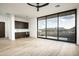 Bright bonus room with kitchenette, sliding doors, and mountain views at 28805 N 114Th St, Scottsdale, AZ 85262