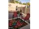 Cozy backyard patio with seating, outdoor decor, and low-maintenance desert landscaping at 12122 N Finch Dr, Fountain Hills, AZ 85268