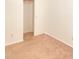 Bright bedroom with neutral carpeting and closet at 2932 N 115Th Ln, Avondale, AZ 85392