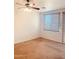 Bright bedroom with ceiling fan and carpeting at 2932 N 115Th Ln, Avondale, AZ 85392