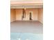 Attached garage with extra storage space and water heater at 2932 N 115Th Ln, Avondale, AZ 85392