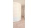 Clean hallway with neutral colored walls and carpet at 2932 N 115Th Ln, Avondale, AZ 85392