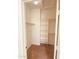 Spacious walk-in closet with built in shelving at 2932 N 115Th Ln, Avondale, AZ 85392