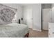 Bright bedroom featuring a full-length mirror, minimalist decor, and neutral tones at 244 N Hawes Rd, Mesa, AZ 85207