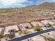 An aerial view of homes in this desert community with private pools and lush green golf course at 41618 N Anthem Ridge Dr, Phoenix, AZ 85086