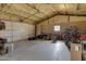 Spacious insulated garage, featuring a large bay door and ample room for vehicles and storage at 4880 E Beehive Rd, San Tan Valley, AZ 85140