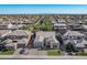 Aerial view of house and neighborhood; mountain views at 9503 W Jj Ranch Rd, Peoria, AZ 85383