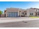 Modern home with landscaped front yard and two car garage at 9503 W Jj Ranch Rd, Peoria, AZ 85383