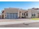 Modern home with landscaped front yard and two car garage at 9503 W Jj Ranch Rd, Peoria, AZ 85383