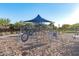 Community playground with shade structure and play equipment at 9503 W Jj Ranch Rd, Peoria, AZ 85383