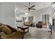 Bright and airy living area enhanced by plantation shutters and an open flow to the kitchen at 3122 E Windmere Dr, Phoenix, AZ 85048