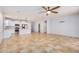 Open concept living area with kitchen and living room at 42356 W Balsa Dr, Maricopa, AZ 85138