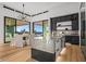 Contemporary kitchen features a marble island and wine storage at 40575 N 109Th Pl, Scottsdale, AZ 85262